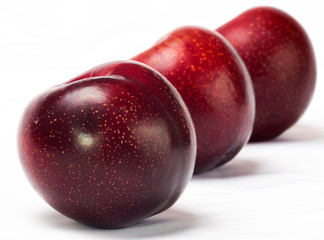  Red plum on a plate