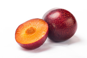  Red plum on a plate
