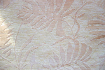 White fabric texture with leaves. Background for design