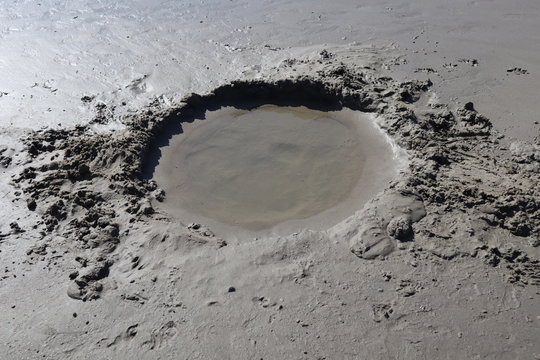 puddle of mud sand