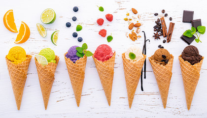 Various of ice cream flavor in cones blueberry ,lime ,pistachio ,almond ,orange ,chocolate ,vanila...
