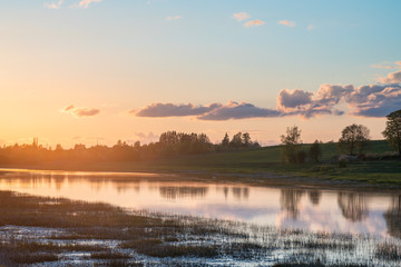 Spring sunset and river in Latvia