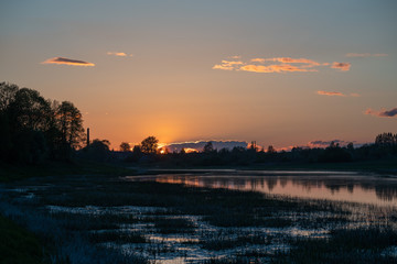 Spring sunset and river in Latvia