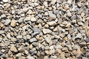 The texture of the stones. Rocky background for design.