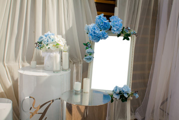 Wedding pillar for seating guests. Accessory of the gala banquet. Groom and bride on wedding day. Empty frame. copy space, top view, flat lay, background with blank space for text. seating plan