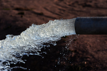water flow out from pipe by pump supply for dry season	