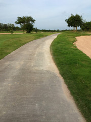 walk way and rough in tropical golf ground