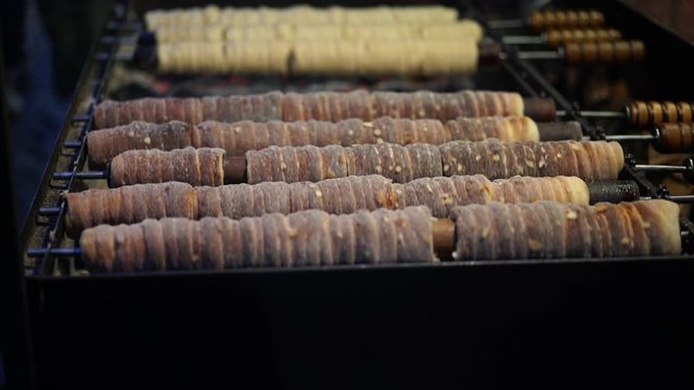 Traditional christmas food from Europe. Rolled dough christmas pastry top with sugar is also known under names Trdelnik, Prügelkrapfen, Baumstriezel, Baumkuchen, Baamkuch, Raguolis or Spettekaka. 