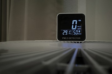 sensor detects no small harmful dust particles in the air. measuring indoor air quality and air purifier effectiveness. air purifier work well no dust found in an interior space. healthy indoor space