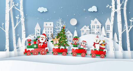 Origami paper art style, Christmas train with Santa Claus and friend in the village, Merry Christmas and Happy New Year © NuTz