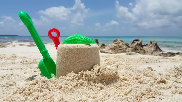 Beach activity for the kids, plastic shovel, sandcastle