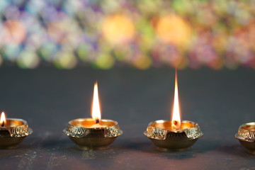 Metal Diyas lit up for the Indian Hindu festival of Diwal