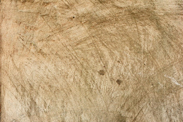 Texture of a concrete wall with cracks and scratches which can be used as a background