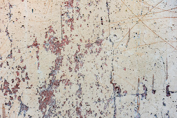 Texture of a concrete wall with cracks and scratches which can be used as a background