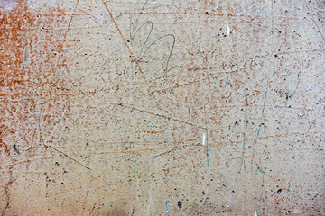 Texture of a concrete wall with cracks and scratches which can be used as a background