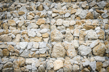 The stone wall at the dam to collect water in Thailand