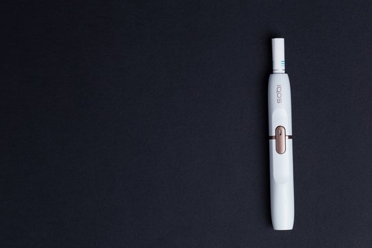 Phillip Morris International's Marlboro IQOS, Electronic Cigarette On A Black Background