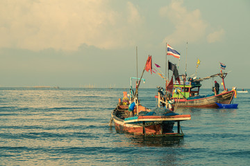 Fishing boats on the sea with blue sky  background