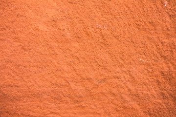 The texture of the red rock wall - Powered by Adobe