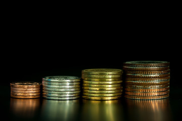 isolated coin stack on black color background