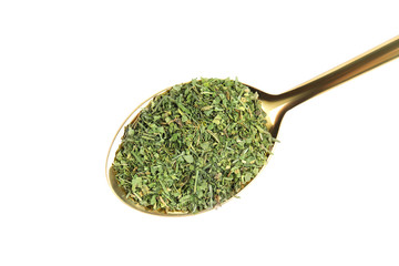 Spoon with dried parsley on white background, top view