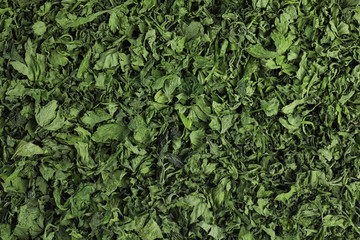 Heap of dried parsley as background, top view
