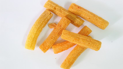closeup shot of crispy fried roll pappad snacks with white background