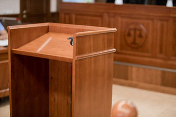 back of attastor talking to magistrate in court. the law adjustment concept