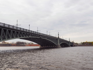 Troitskiy Bridge, view from Neva river, Saint-Petersburg. Selective focus.