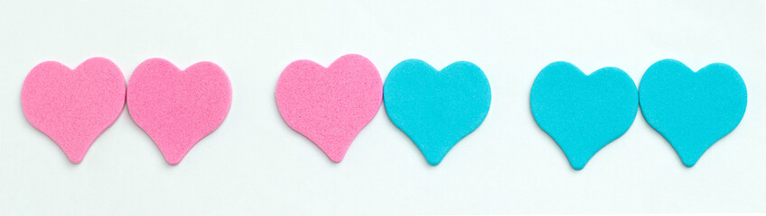blue and pink hearts on a white background symbol of same sex and heterosexual relationships wide banner