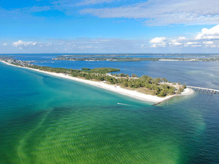 Fototapeta na wymiar Aerial view of Anna Maria Island, white sand beaches and blue water, barrier island on Florida Gulf Coast. Manatee County. USA