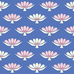Floral seamless repeat pattern in pink, blue and cream. A pretty background of stylized flowers in a geometric design.
