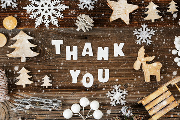 White Letters Building The Word Thank You. Wooden Christmas Decoration Like Sled, Tree, Snowflakes...