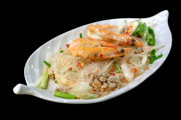Shrimp Vermicelli Salad sea food or Spicy Salad on black background, focus selective.