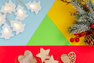 colorful Christmas background with space for text and wooden Christmas toys