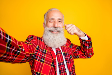 Closeup photo of cool look grandpa guy playing with white stylish mustache making selfies wear...