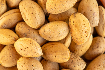 Close up of whole raw almonds. 