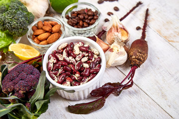 Liver detox diet food concept . Foods for healthy liver on white wooden background. Health foods high in antioxidants and fiber..