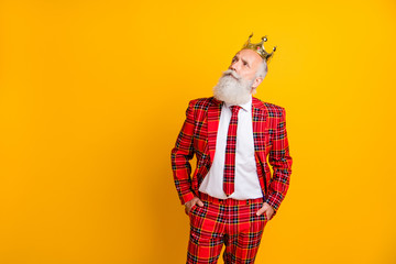 Portrait of his he nice handsome attractive arrogant rich wealthy proud gray-haired man thinking creating idea isolated over bright vivid shine vibrant yellow color background