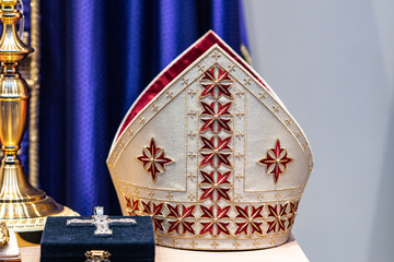 Mitre or miter, traditional ceremonial head-dress of bishops and certain abbots in traditional...