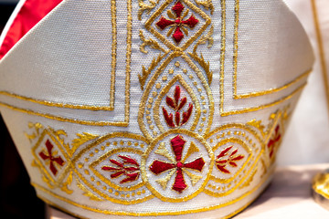 Mitre or miter, traditional ceremonial head-dress of bishops and certain abbots in traditional Christianity