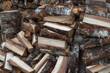 A pile of firewood for the stove, background