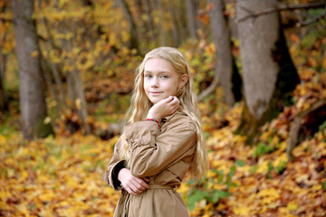 Young Girl in autumn park