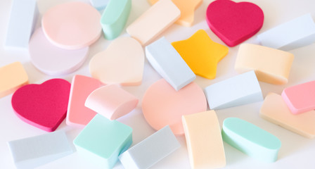 Assorted cosmetic sponges.