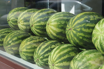 watermelons on display at the market