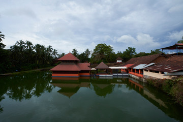 Fototapeta na wymiar Ananthapura Lake Temple in Kerala, India. This Hindu Temple is located on a small lake.