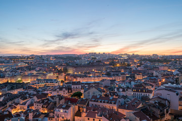 Sunset and Night view of Lisbon city from Miradouro da Graca