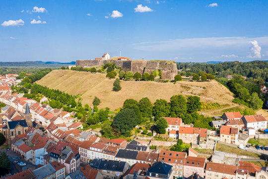 Bitche historical town center and star shaped bastions and outworks of hilltop Citadelle de Bitche, medieval fortress and stronghold near German border in Moselle department, Grand Est, France