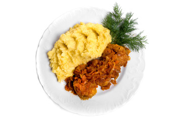 Stewed fish with mashed potatoes isolated on white. Top view.