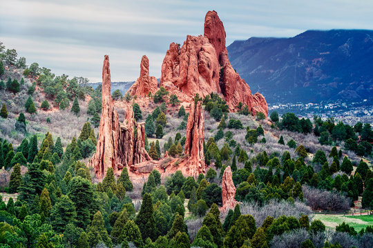 Small red peaks and rock formations at dusk at the Garden of the Gods State Park in Colorado Springs, Colorado, United States.